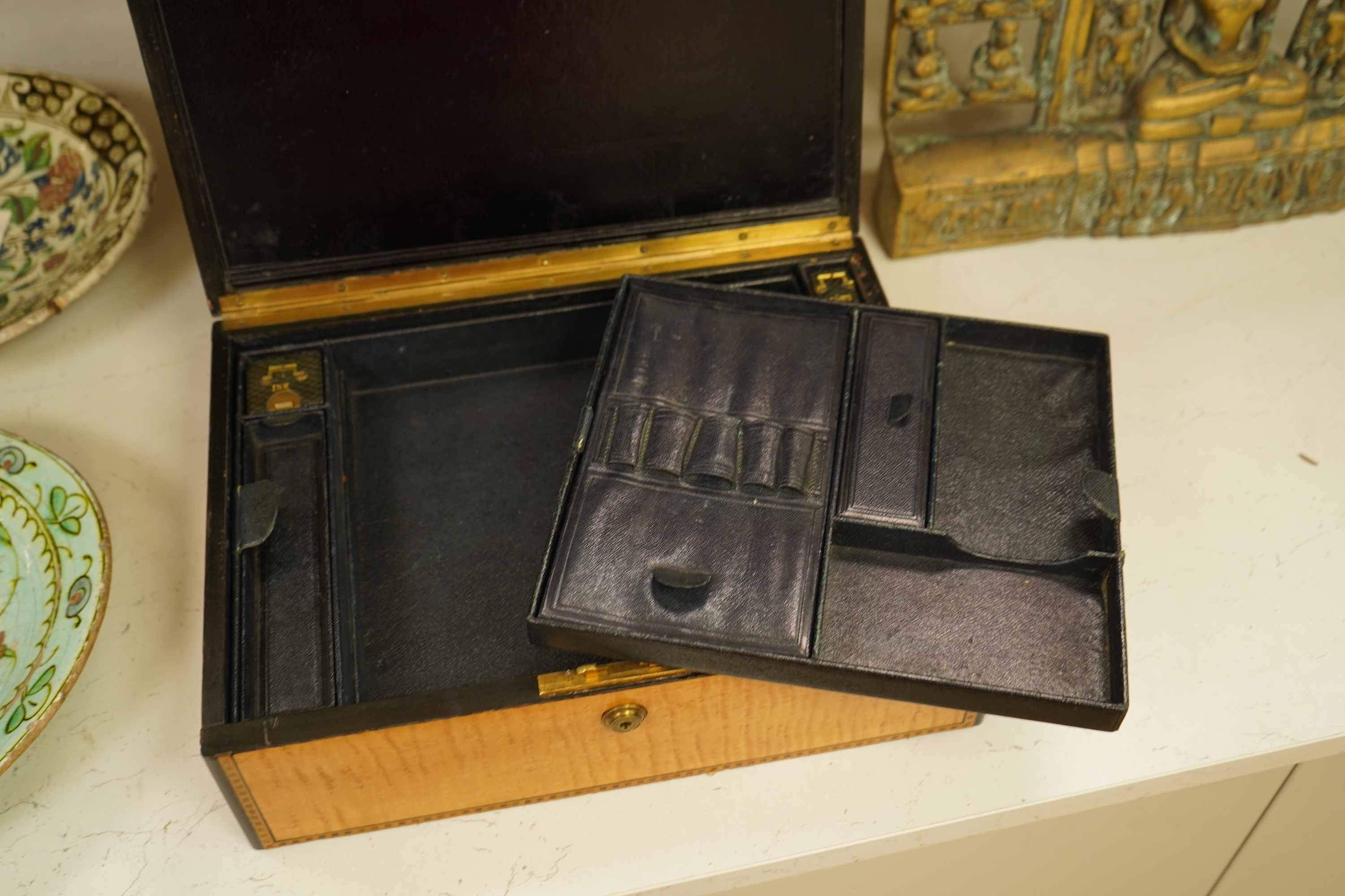 A Victorian sycamore stationery box with fitted interior and inlaid banding, with key, 37cm wide